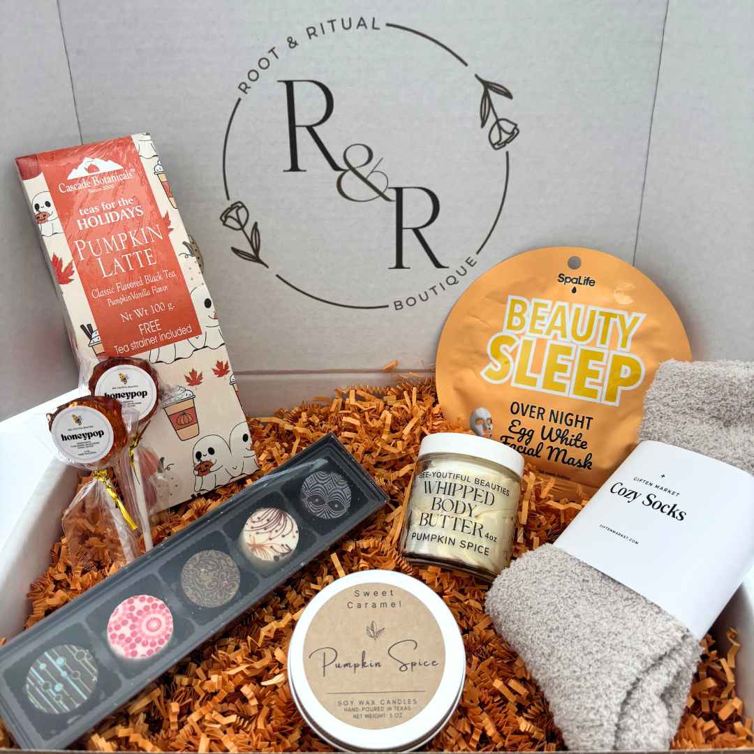 fall self care gift box with pumpkin spice treats, Korean skincare, tea, fall candle, chocolates, and cozy socks
