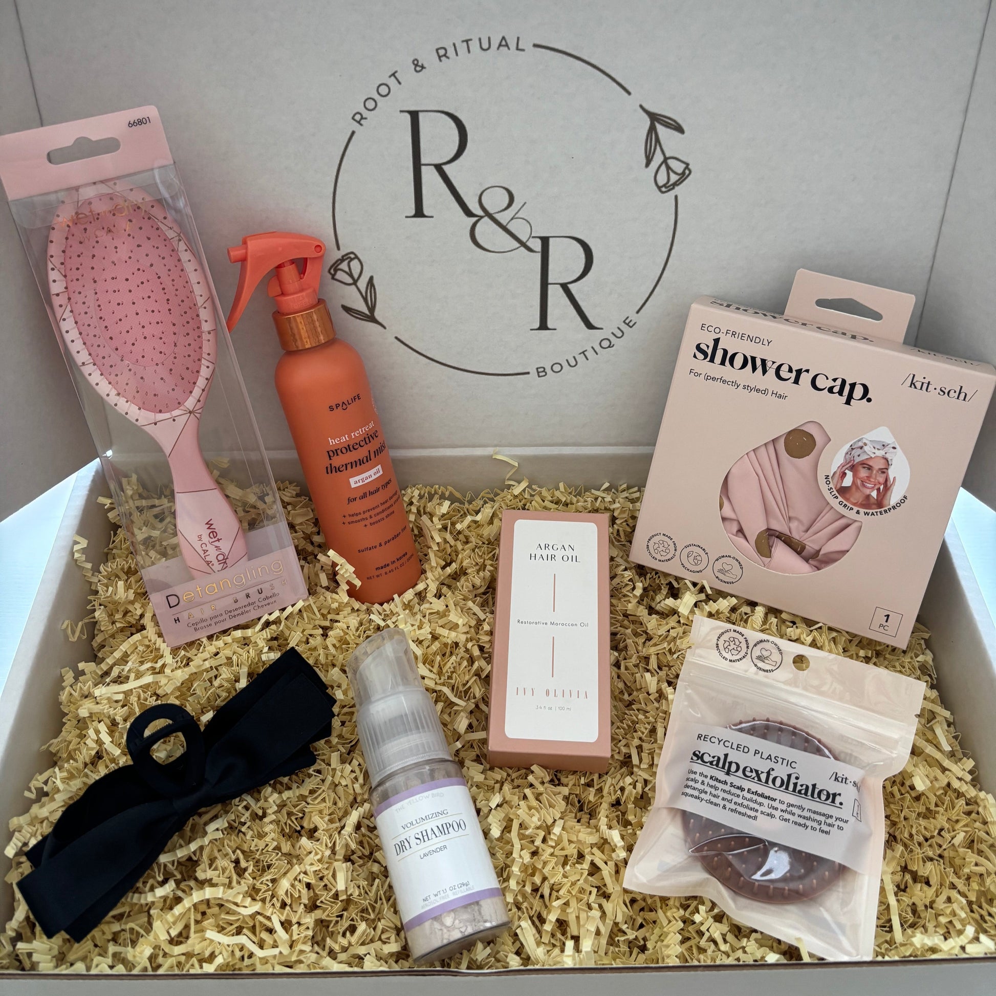 Grooming products, hair products, hair care, detangling hair brush, shower cap, scalp exfoliator, dry shampoo, protective thermal mist, heat protectant spray, argan hair oil, Moroccan hair oil, black hair clip, hair bow