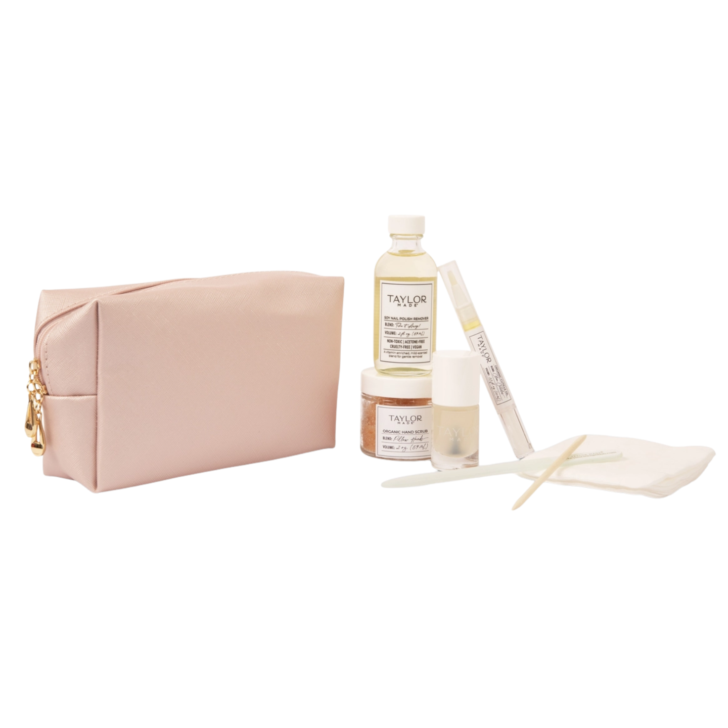 Taylor made Organic Manicure set featuring vegan leather rose gold clutch, organic hand scrub, soy nail polish remover, lint free pads, cuticle pusher, cuticle oil pen, glass nail file, base coat, top coat, clear coat nail polish